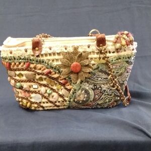 Artisan Embroidered Shoulder Bag with Floral Accent